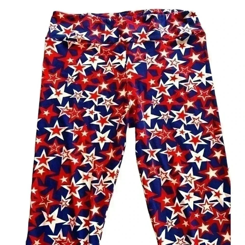 Lularoe TC blue leggings with red& white stars. NWOT .
